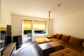WE EG rechts: Wohnzimmer mit Zugang zur Terrasse