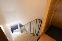 Treppenaufgang zu den Oberwohnungen